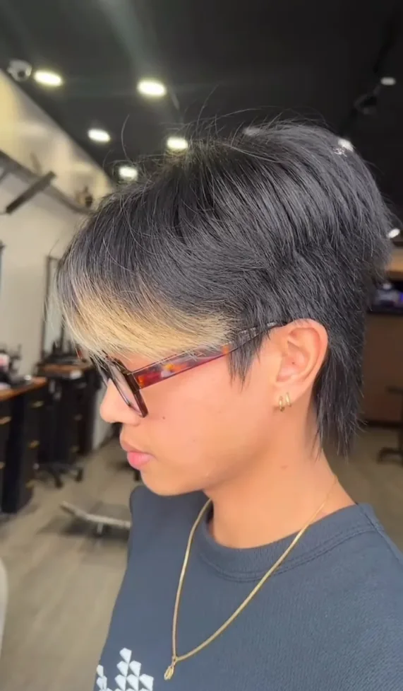 Layered textured haircut with long fringe